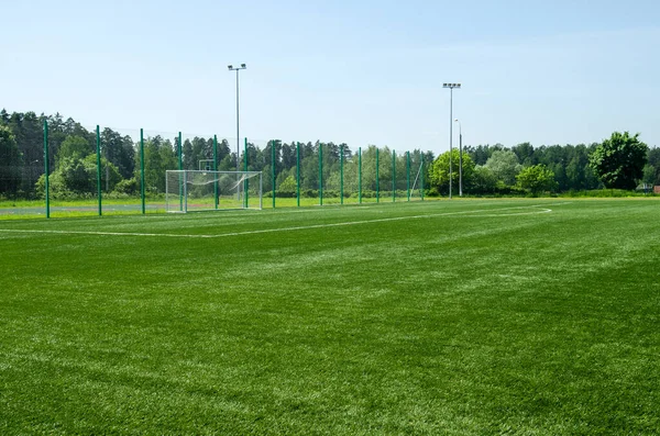 Voetbalveld Met Groene Kunstgras Voetbal Doel Achtergrond — Stockfoto