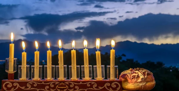 Festive Composition Hanukkah Burning Candles Lantern Sweet Donuts Dark Sky — Stock Photo, Image
