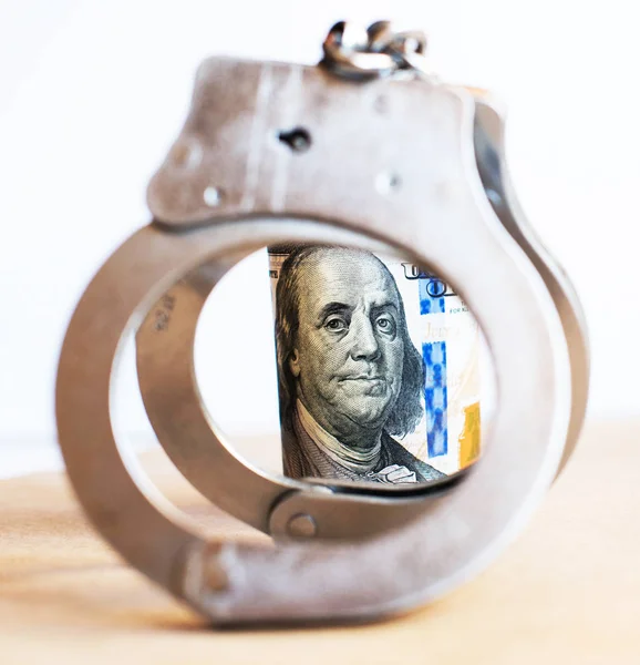 Dollar Und Handschellen Als Abstraktes Symbol Für Finanzverbrechen Und Korruption — Stockfoto