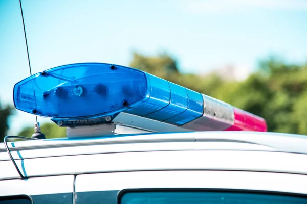 Signal lamp on the police car close-up. (Security, help, law - concept)