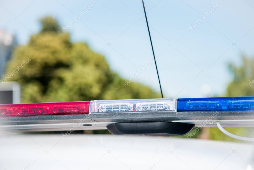 Signal lamp on the police car close-up. (Security, help, law - concept)