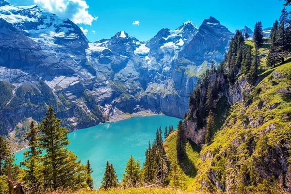 Beautiful magical landscape with the lake Oeschinensee in the Swiss Alps, near Adelboden, Switzerland, Europe