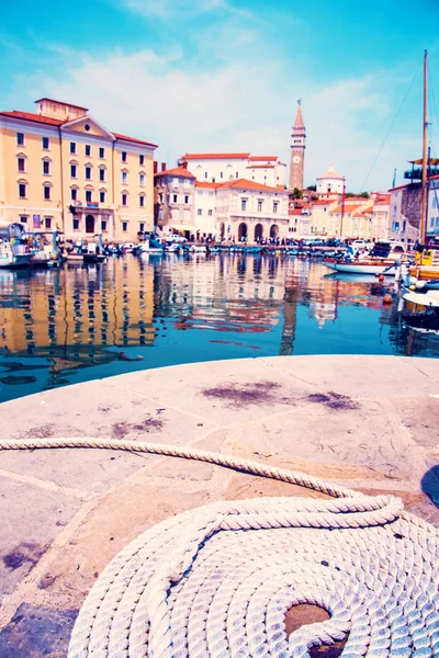 Beautiful amazing city scenery on the waterfront with old clock — Stock Photo, Image