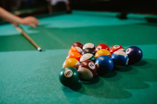 Closeup of colorful balls on a pool table. Fun time