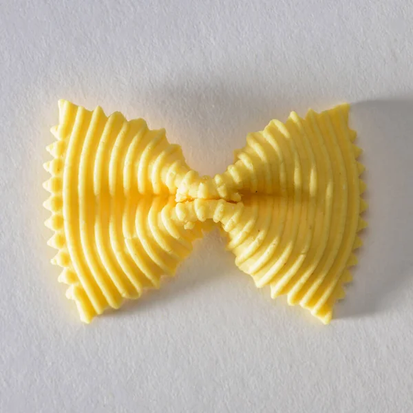 Colored Bow Tie Pasta Closeup Single Yelow Farfalle — Stock Photo, Image