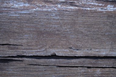 Eski ahşap yüzeyin soyut arka planı yağmurdan sonra ıslaktır. Sanat eserleri için üst görünümü kapat.