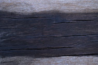 Eski ahşap yüzeyin soyut arka planı yağmurdan sonra ıslaktır. Sanat eserleri için üst görünümü kapat.