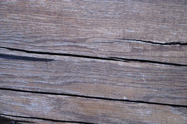 Eski ahşap yüzeyin soyut arka planı yağmurdan sonra ıslaktır. Sanat eserleri için üst görünümü kapat.