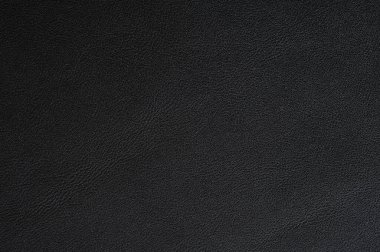 Arkaplan için pürüzsüz siyah deri dokunun yakınlaştırılması
