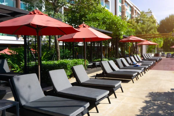 Outdoor chair in hotel resort in day time.