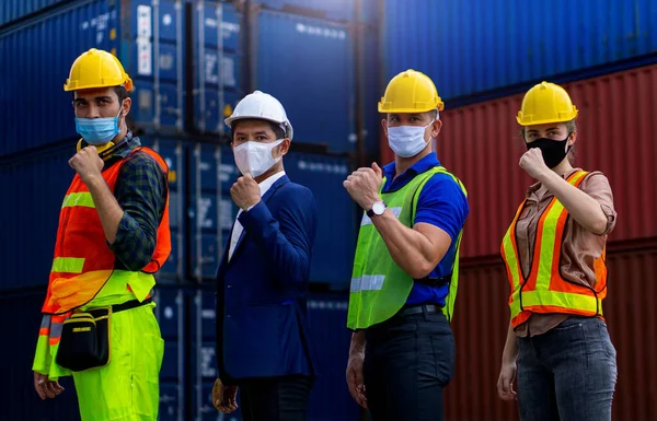 Industrial Workers Engineers Wearing Coronavirus Covid Protective Masks Lift Fist — Stock Photo, Image