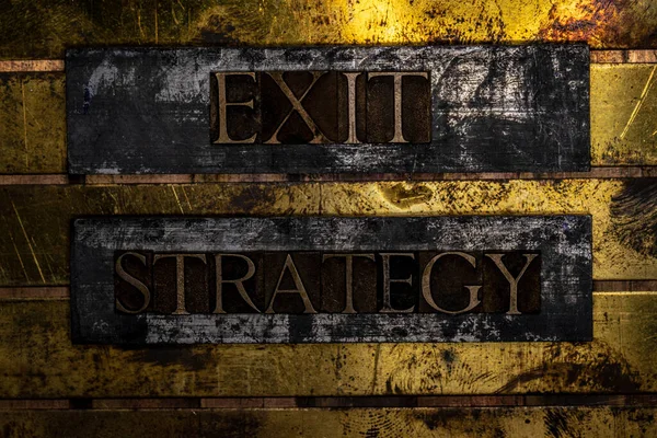 Exit Strategy text message on textured grunge copper and vintage gold background