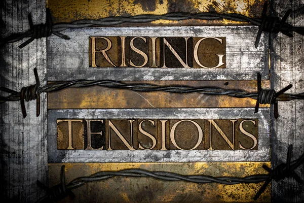 Rising Tensions Text Created Real Authentic Typeset Letters Surrounded Ostbed — Stock fotografie