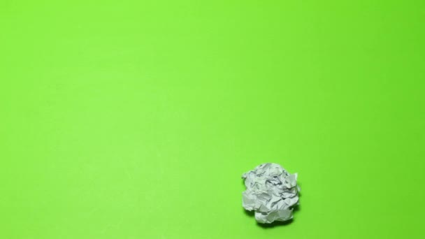 Crumpled Paper Ball Green Background Screen Wrinkles Ball Paper Leaves — Stock Video