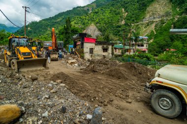 September18th2025 Dehradun Uttarakhand, India. Heavy machines remove rubble in Sahastradhara village after cloudburst floods Badli river, rescue teams search for missing.