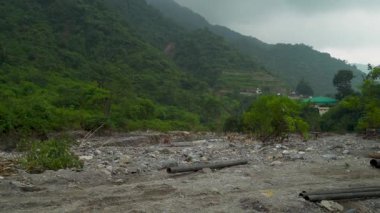 September20th2025 Dehradun Uttarakhand, India. Flash flood from Rispana River hits village farms and homes in Rajpur, Dehradun, Uttarakhand hills. Aftermath of floods. Scattered debris.