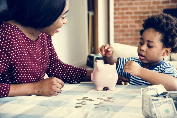 Mom Son Saving Money Piggy Bank — Stock Photo, Image