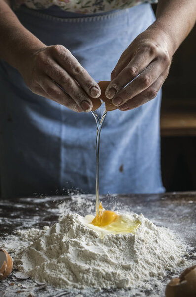 A housewife making a dough