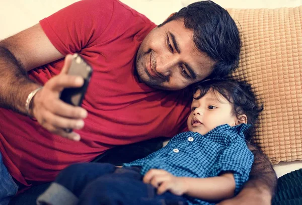 Happy Indian Family Father Son Using Phone — Stock Photo, Image