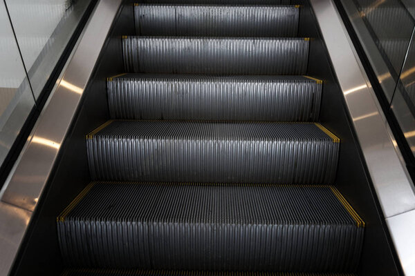 Escalator stairs in metro 