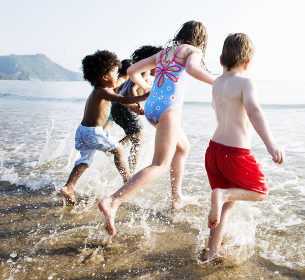 Children having fun on the beach