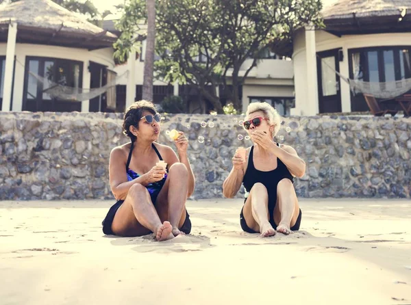 Mature Women Tanning Beach — Stock Photo, Image