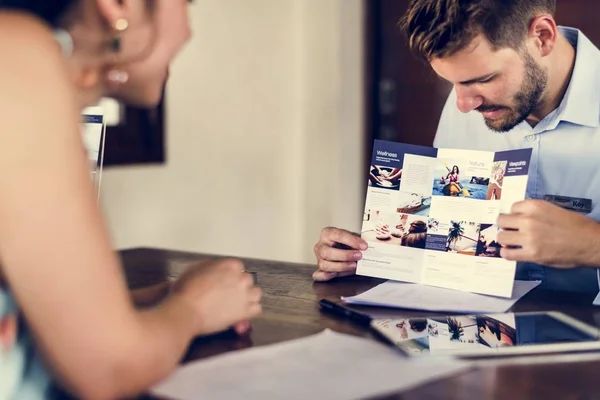 Guest booking a tour at a hotel