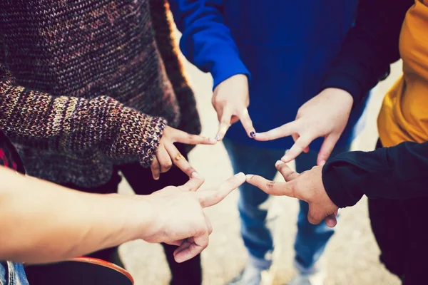 Group Friends Using Fingers Form Star — Stock Photo, Image