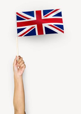 Büyük Britanya Birleşik Krallık ve Kuzey İrlanda bayrağı sallayarak kişi