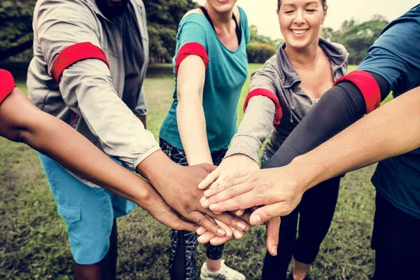 Equipo Diverso Apilando Sus Manos — Foto de Stock