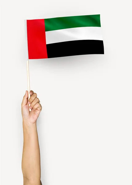 Ruka Ukazující Vlajka Spojených Arabských Emirátů — Stock fotografie