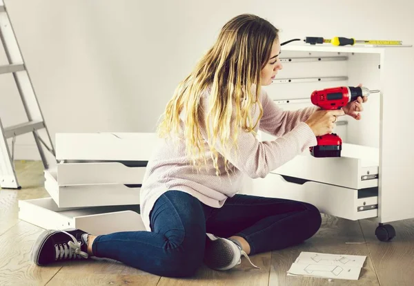 Woman Using Electronic Drill Install Cabinet — Stock Photo, Image