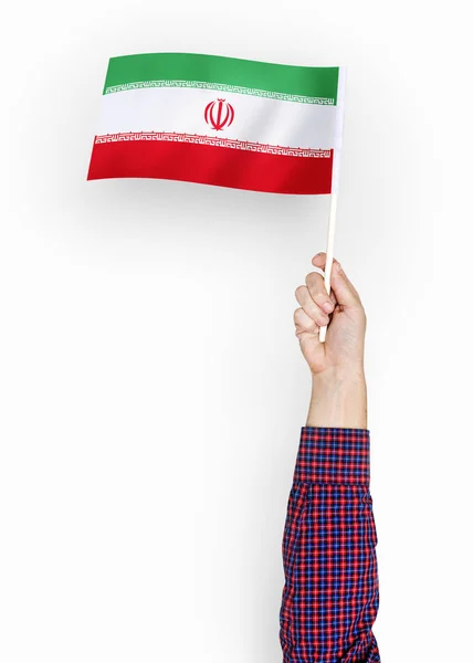 Osoba Macha Flagą Islamskiej Republiki Iranu — Zdjęcie stockowe