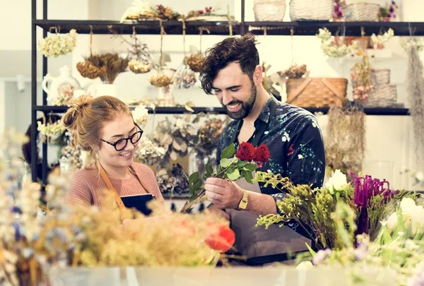 stock image Florists making flower bouquet together