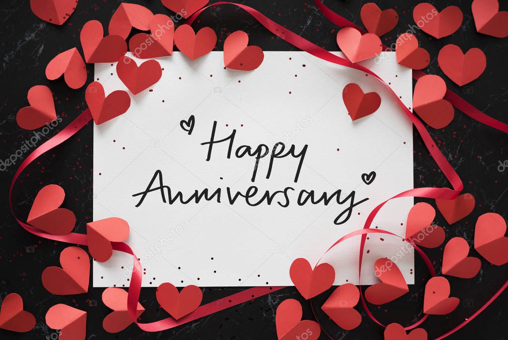 Happy Anniversary card decorated with heart shapes