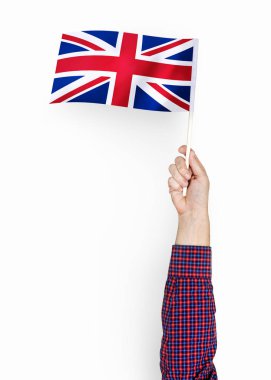 Büyük Britanya Birleşik Krallık ve Kuzey İrlanda bayrağı sallayarak kişi