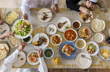 Muslim family having a Ramadan feast clipart