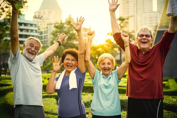 Happy Sportive Senior People Hands Raised Park — Stock Photo, Image