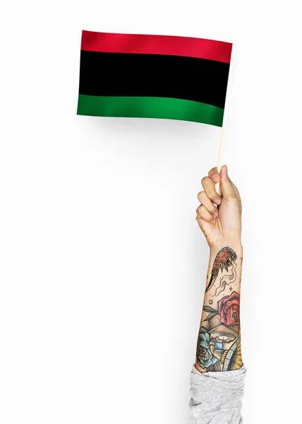 Person Waving Flag Pan African Flag — Stock Photo, Image