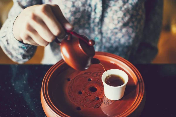 Woman Pouring Tea Cup — Stock Photo, Image