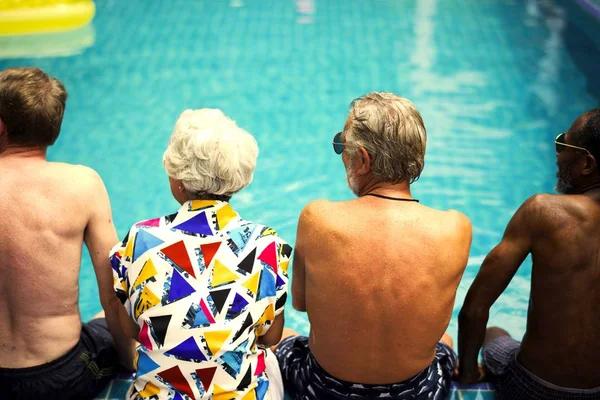 Seniors Sitting Swimming Pool — Stock Photo, Image