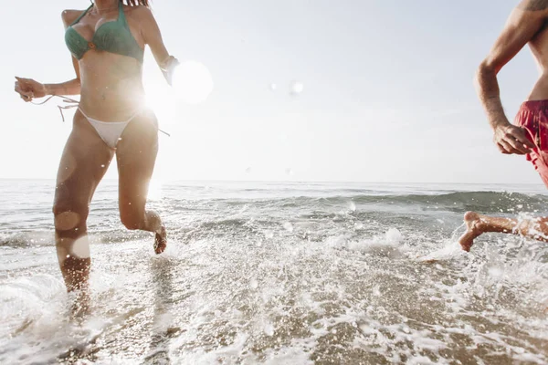 Cheerful Couple Running Shore — Stock Photo, Image