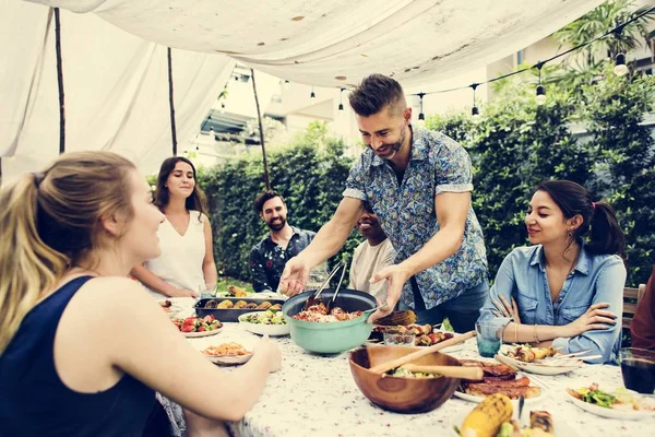 Group of diverse friends enjoying summer party together