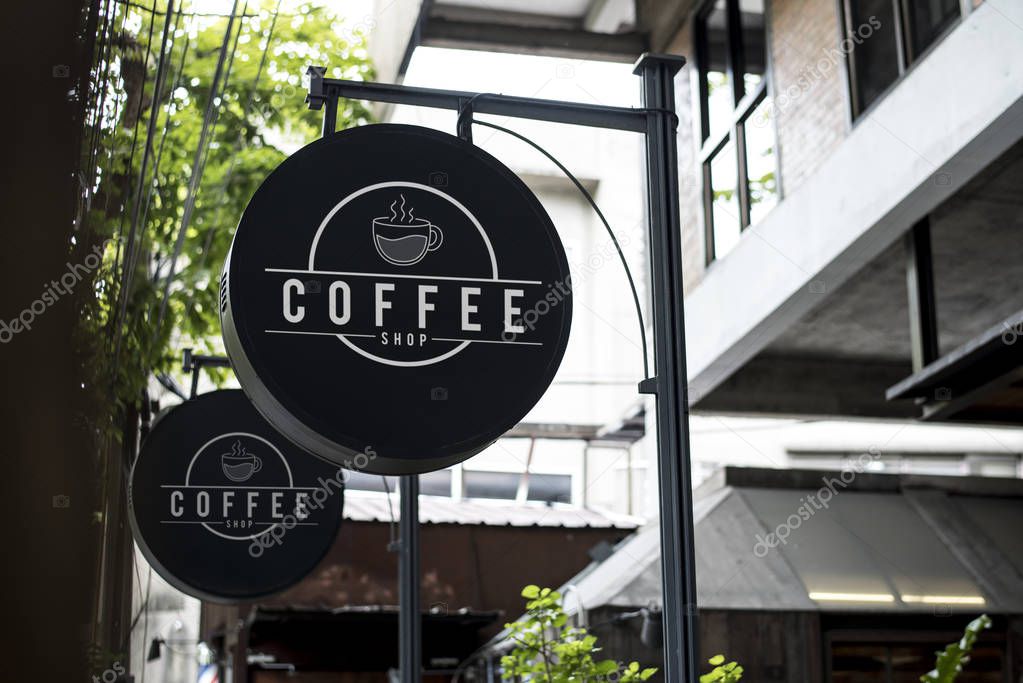 Black sign outside a restaurant mockup