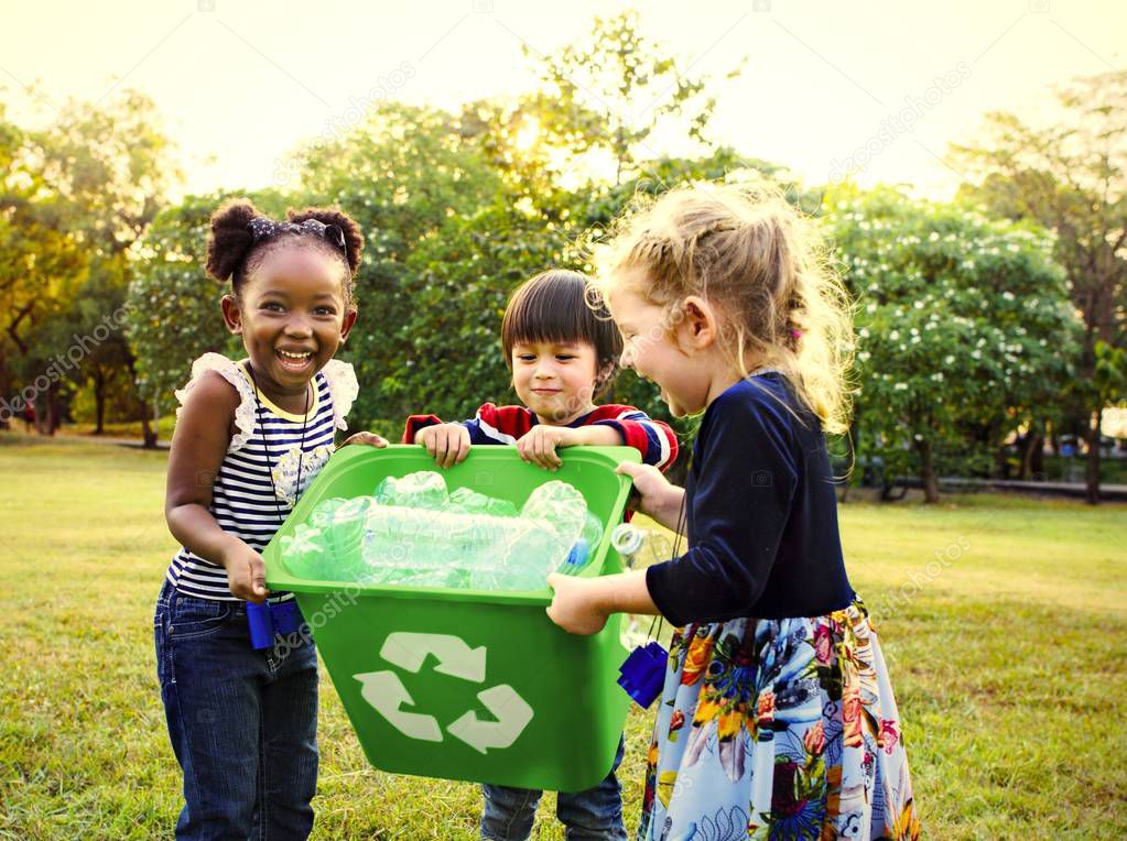 Kids learning how to recycle trash