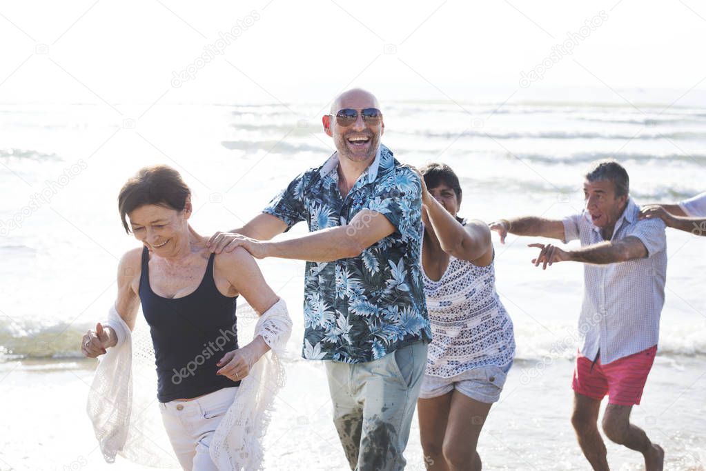 Group of seniors on the beach