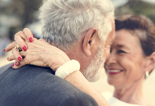 Mature couple getting married at the beach