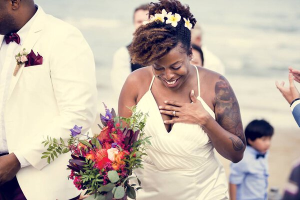 Happy bride and groom in a wedding ceremony at a tropical island