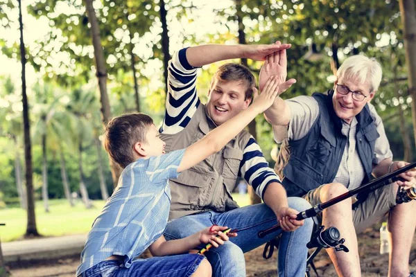 Family Making High Five While Fishing — Stock Photo, Image