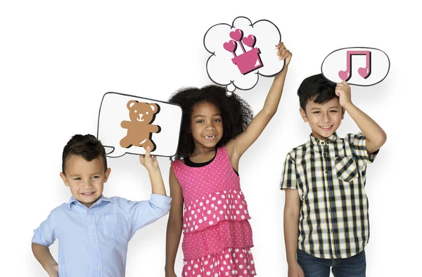 Happy Kids Holding Speech Bubbles — Stock Photo, Image